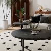 Modern coffee table with two display shelves, Black Faux marble surfaces, Tripod-inspired base,Rounded tabletop edges - Matte Black - MDF