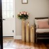 Metal decorative vases High distress metal center vases with growing vine patterns